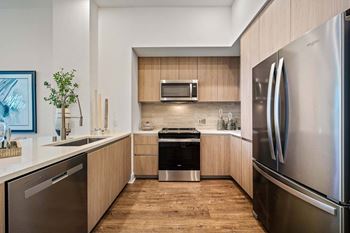 Quartz and granite countertops with full-height backsplash